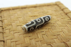 An Unparalleled Modern 9 Eye True Agate Dzi Bead