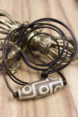 Accumulation of Influence Nine Eye Dzi Bead Necklace