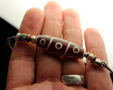 9 Eye Dzi Necklace by Sander Cohen