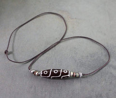 9 Eye Dzi Necklace by Sander Cohen