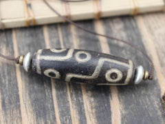 Accumulation of Influence Nine Eye Dzi Bead Necklace