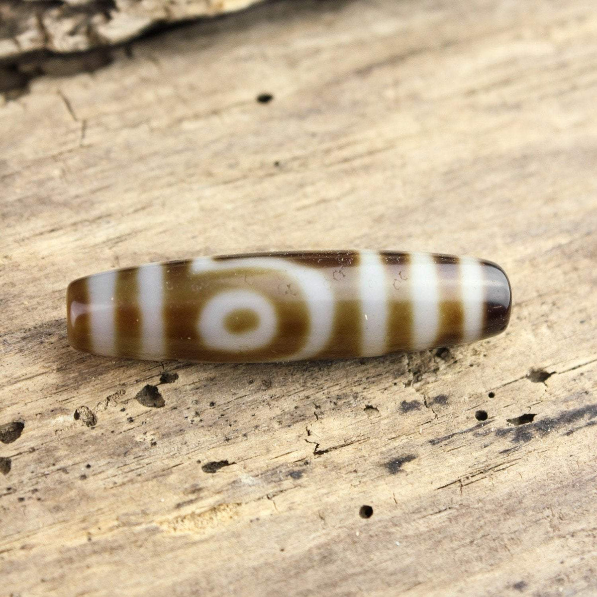 Balancing Double Eyed Tibetan Dzi Bead
