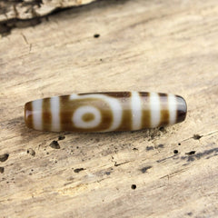 Balancing Double Eyed Tibetan Dzi Bead