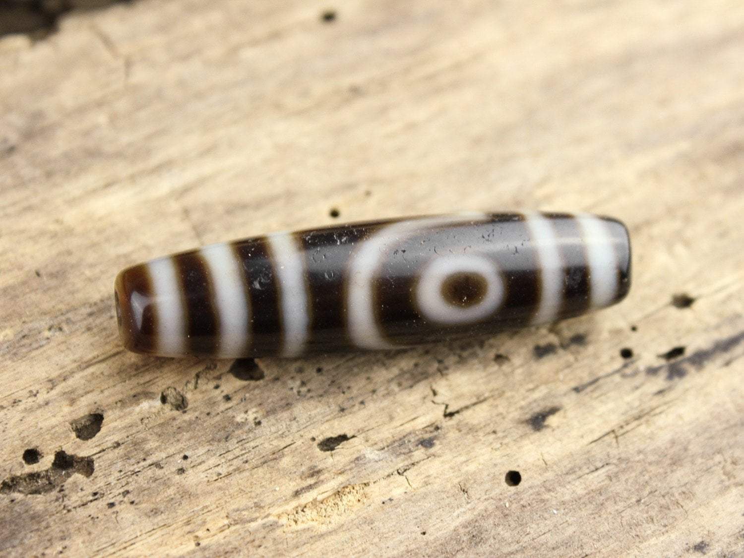 Balancing Double Eyed Tibetan Dzi Bead