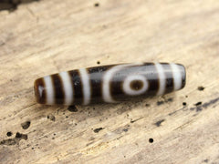 Balancing Double Eyed Tibetan Dzi Bead