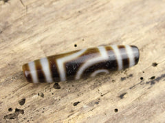 Balancing Double Eyed Tibetan Dzi Bead