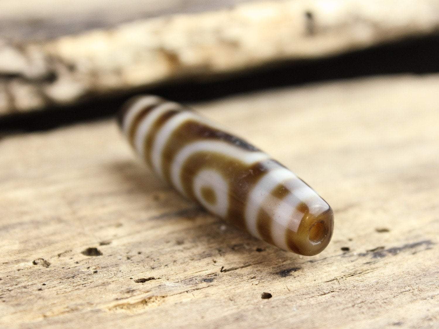 Balancing Double Eyed Tibetan Dzi Bead