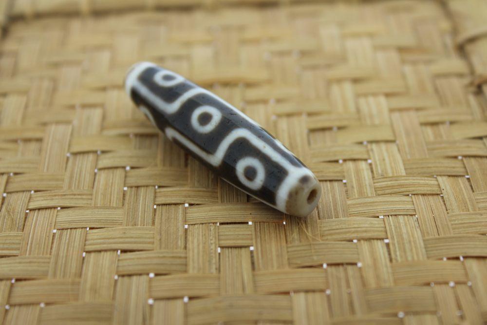 An Unparalleled Modern 9 Eye True Agate Dzi Bead