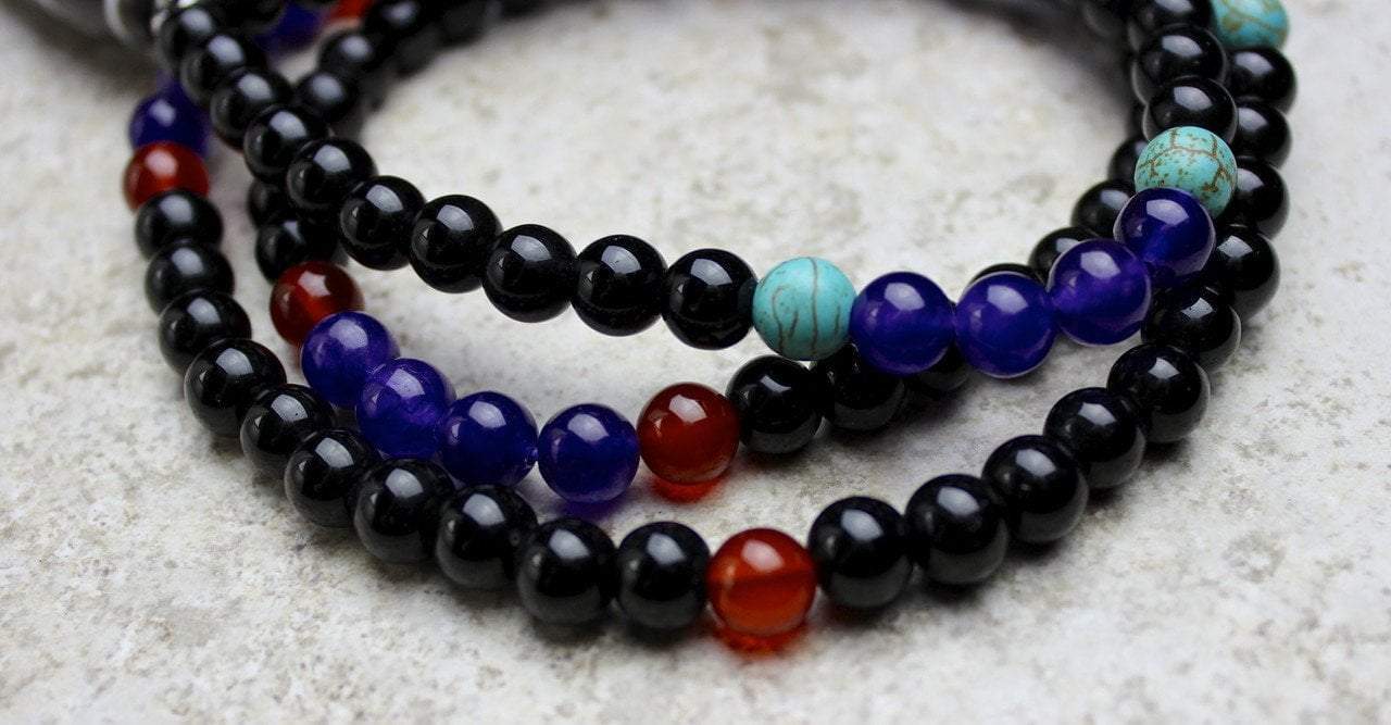 3 Eye Dzi Bead Mala with Onyx and Amethyst
