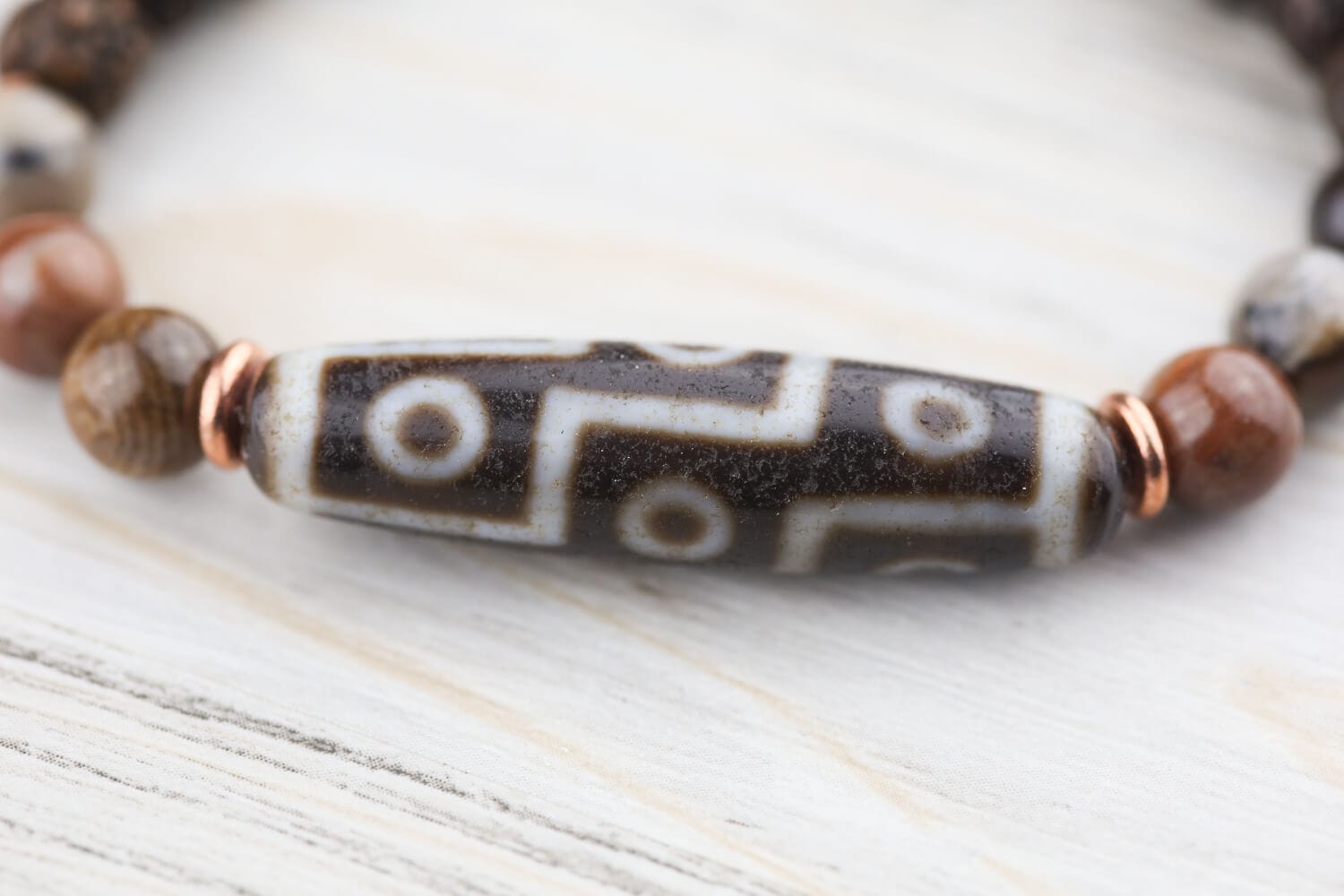 9 Eye Dzi Astrology & Petrified Wood Wrist Mala