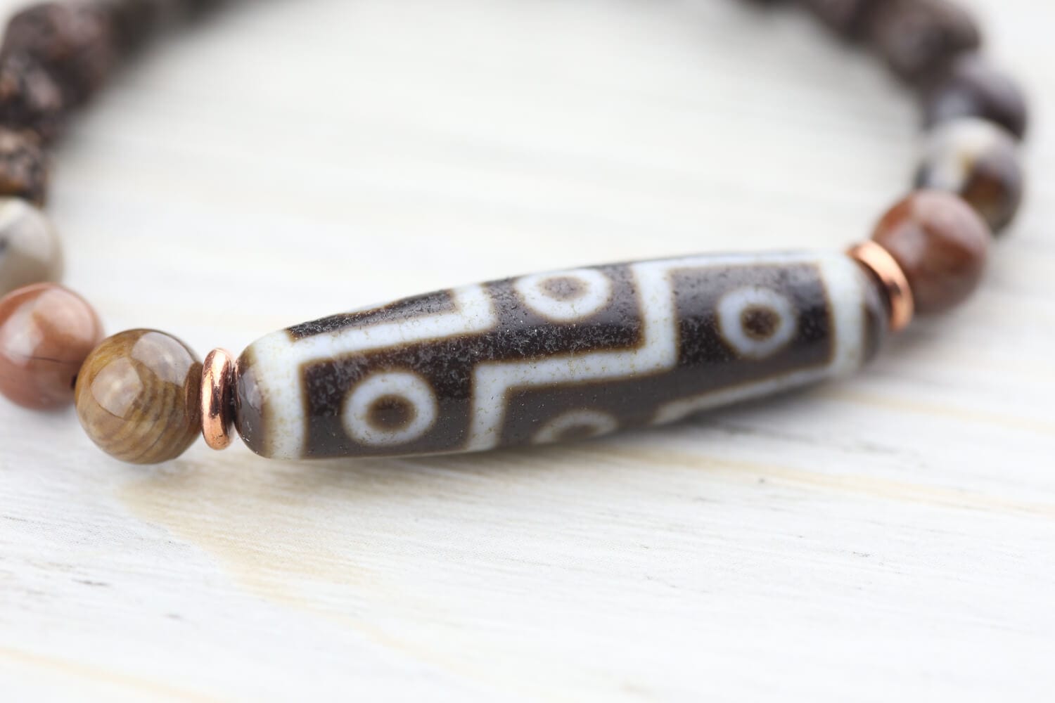 9 Eye Dzi Astrology & Petrified Wood Wrist Mala
