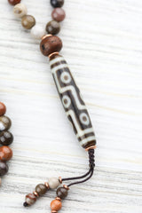 9 Eye Dzi Astrology & Petrified Wood Mala