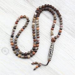 9 Eye Dzi Astrology & Petrified Wood Mala