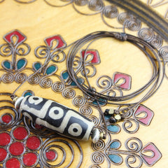Accumulation of Influence Nine Eye Dzi Bead Necklace