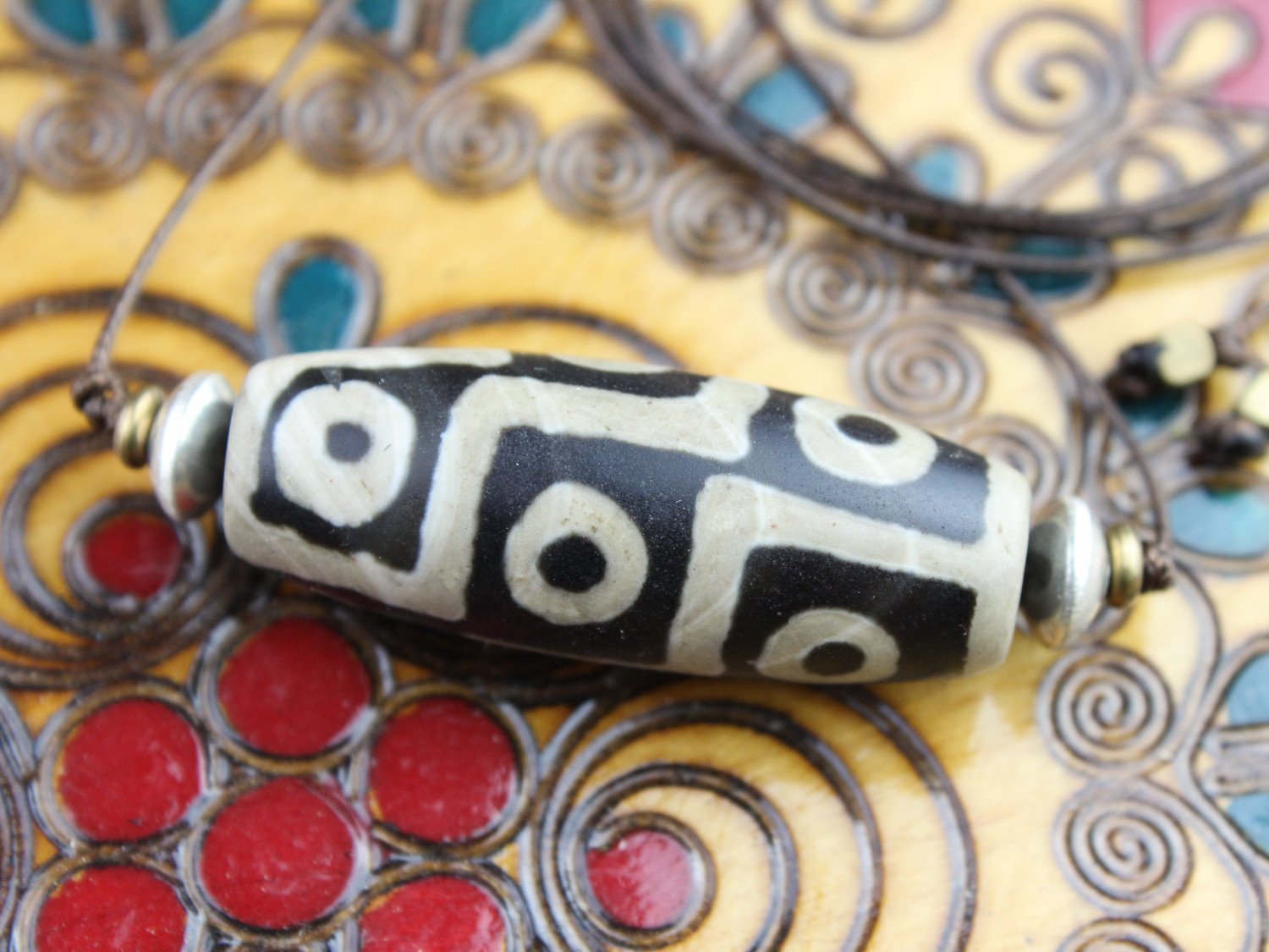 Accumulation of Influence Nine Eye Dzi Bead Necklace