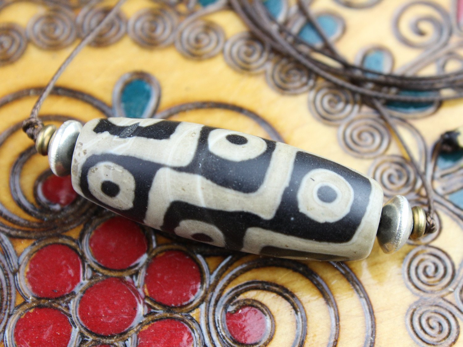 Accumulation of Influence Nine Eye Dzi Bead Necklace