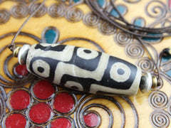 Accumulation of Influence Nine Eye Dzi Bead Necklace