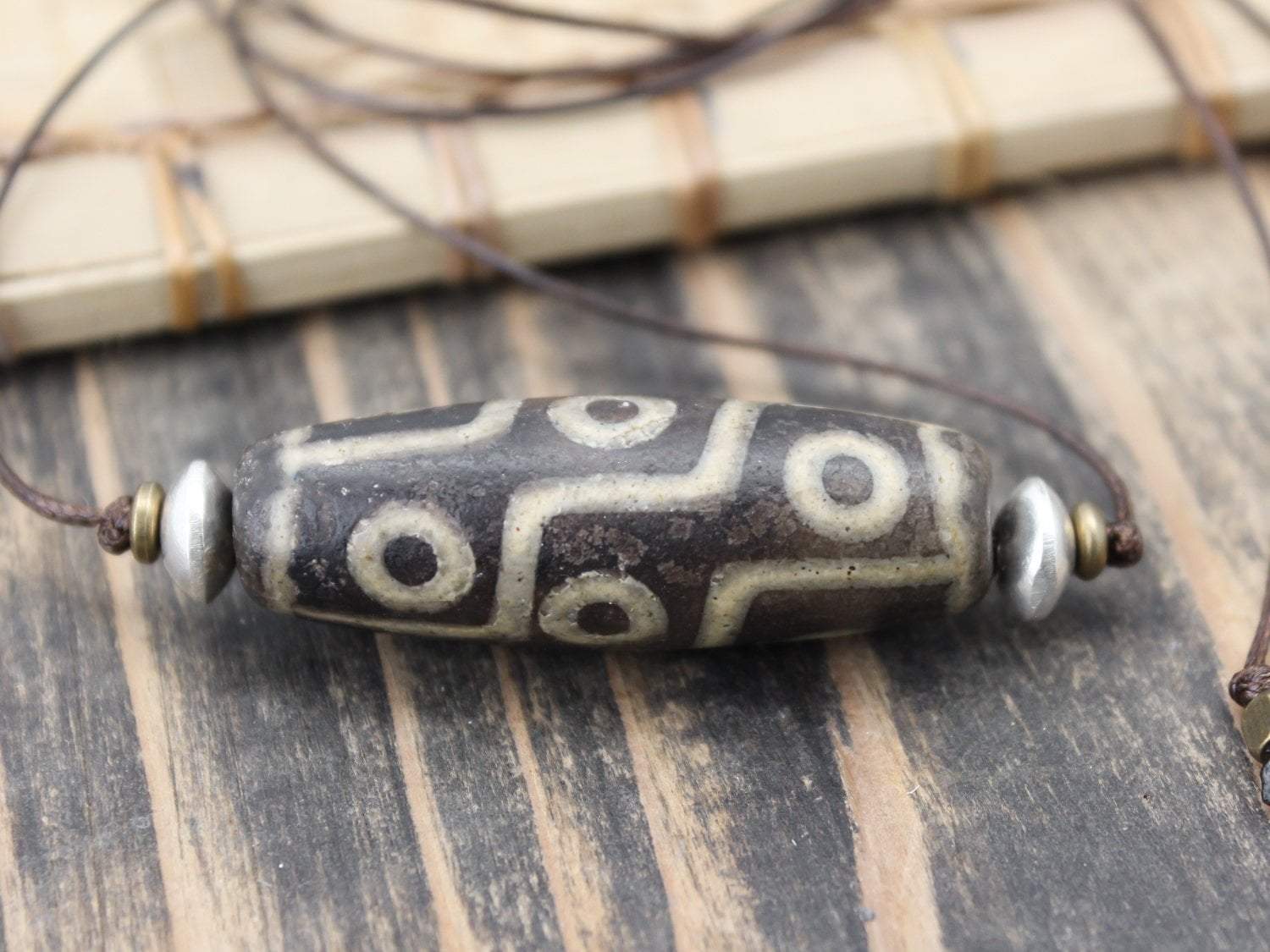 Accumulation of Influence Nine Eye Dzi Bead Necklace